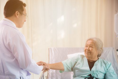 doctor with elderly senior patient